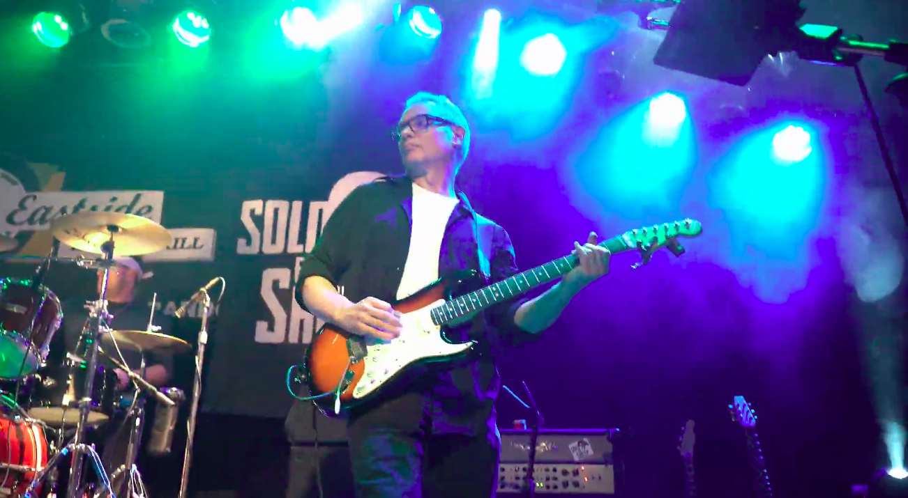 Sold For Sheep guitarist performing live
